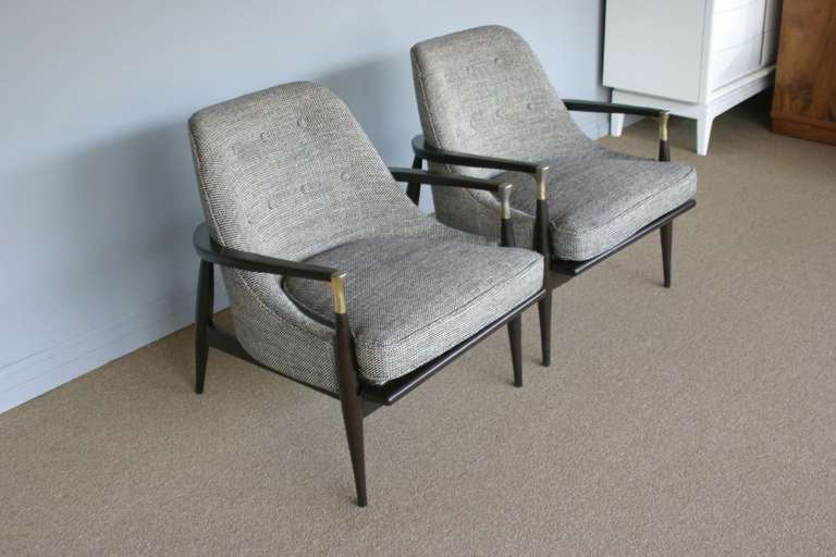 Pair of lounge chairs att: Ib Kofod Larsen.  Espresso finished frames with brass accents and tweed fabric. 