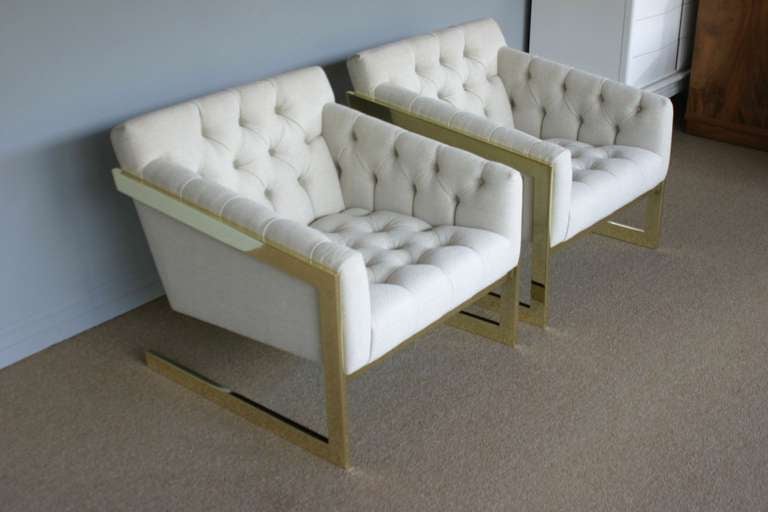 American Pair of brass framed and tufted cantilevered lounge chairs by Milo Baughman