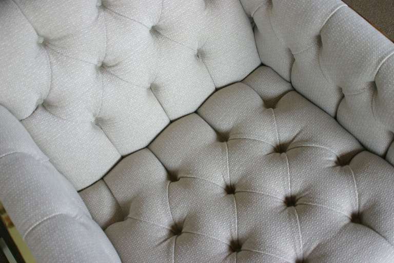 Brass Pair of brass framed and tufted cantilevered lounge chairs by Milo Baughman