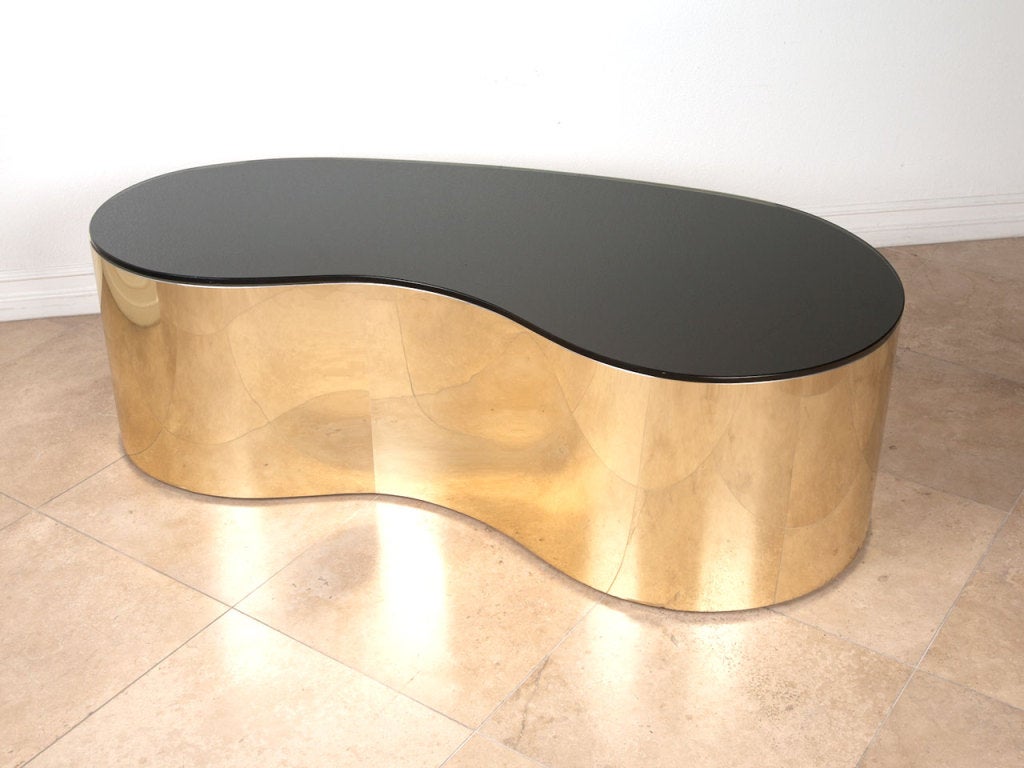 Free form coffee table by Karl Springer. Rare iconic design.