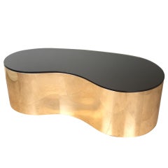 Free form coffee table by Karl Springer