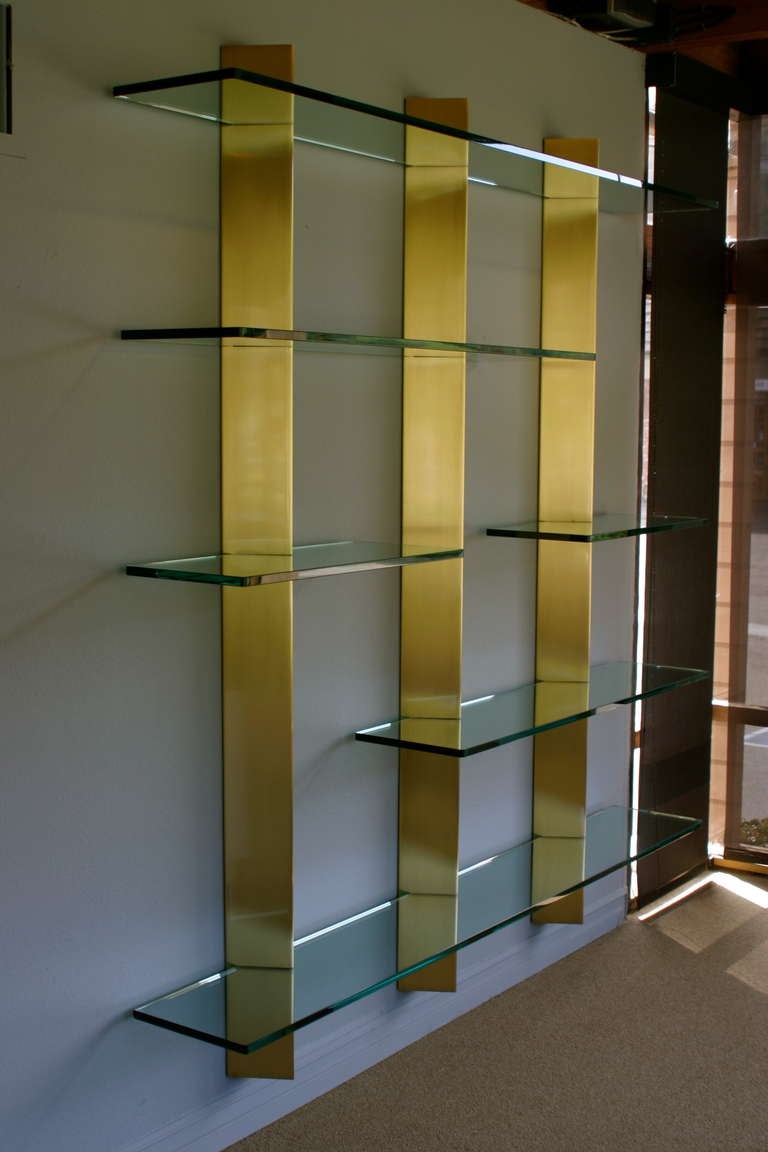 70's Custom brass & glass floating wall unit / shelves.  The glass measures 3/4