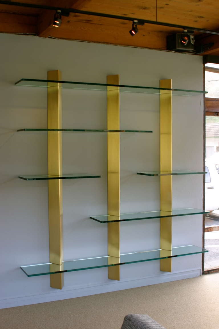 70's Custom brass & glass floating wall unit  In Excellent Condition In Costa Mesa, CA