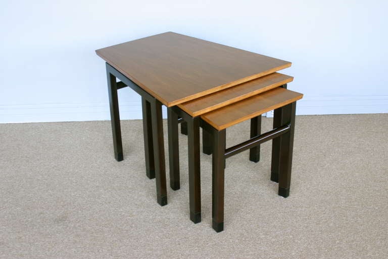 Set of nesting tables by Edward Wormley for Dunbar.  Retains original Leather wrapped feet.   