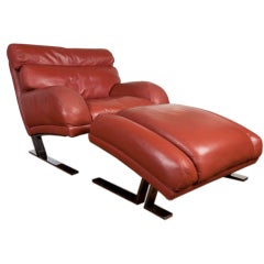 Leather lounge chair and ottoman by Milo Baughman / Directional