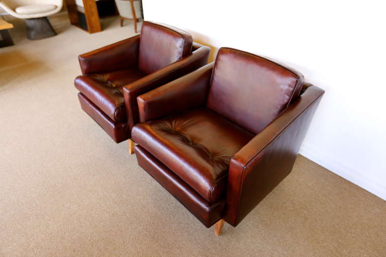 American Pair of Ox Blood Leather Lounge Chairs by J. Wanamaker Inc.