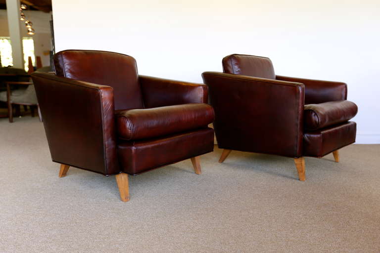 Mid-Century Modern Pair of Ox Blood Leather Lounge Chairs by J. Wanamaker Inc.
