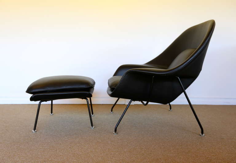 Early Black Leather Eero Saarinen ''Womb Chair'' and Ottoman for Knoll.