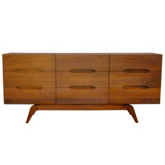 Solid walnut dresser with sculptural legs