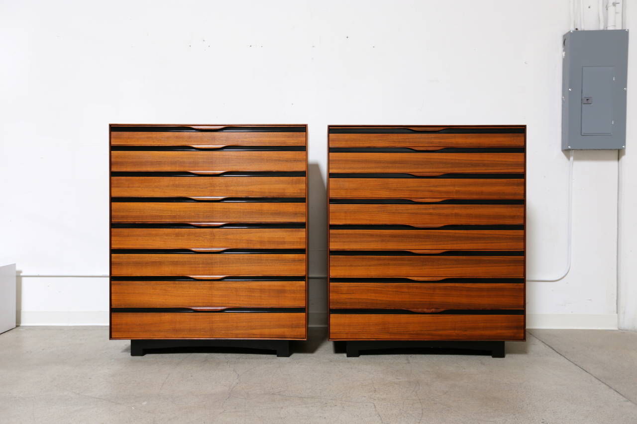 Pair of tall chests of drawers by John Kapel for Glenn of California. 16 drawers total. Beautiful walnut grain.