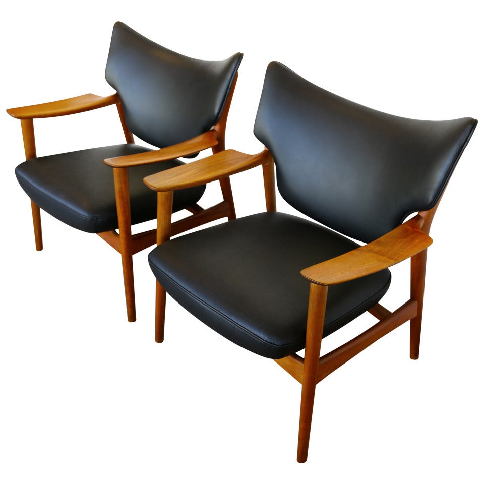 Pair of Sculptural Leather and Teak Lounges by Peter Wessel