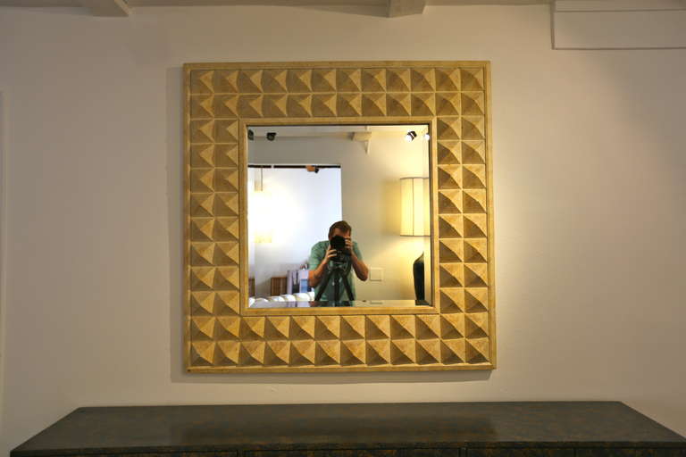 Geometric Pyramid framed mirror.