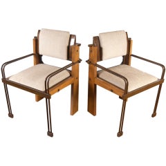 Unique pair industrial modern arm chairs