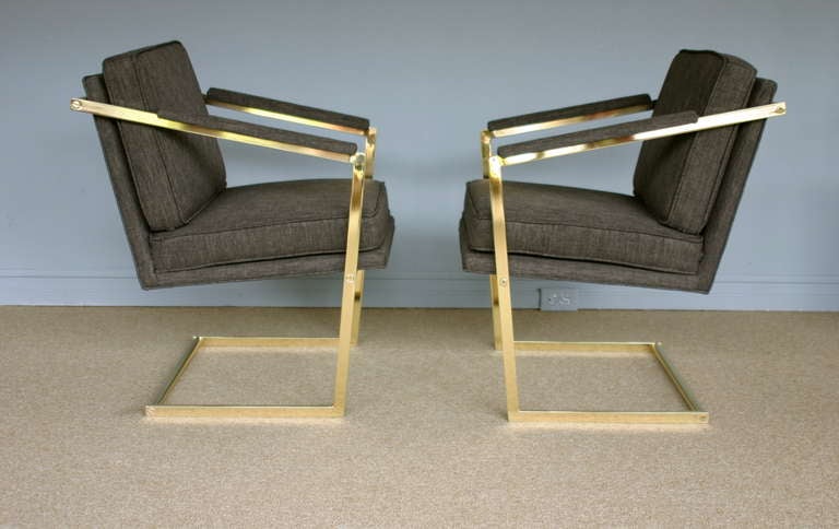 Pair of brass cantilevered arm / lounge chairs by Richard Thompson for Glenn of California.