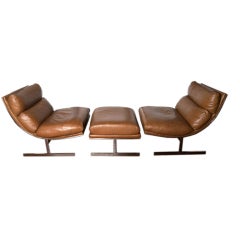 Leather and chrome lounge chairs w/ ottoman by Kipp Stewart