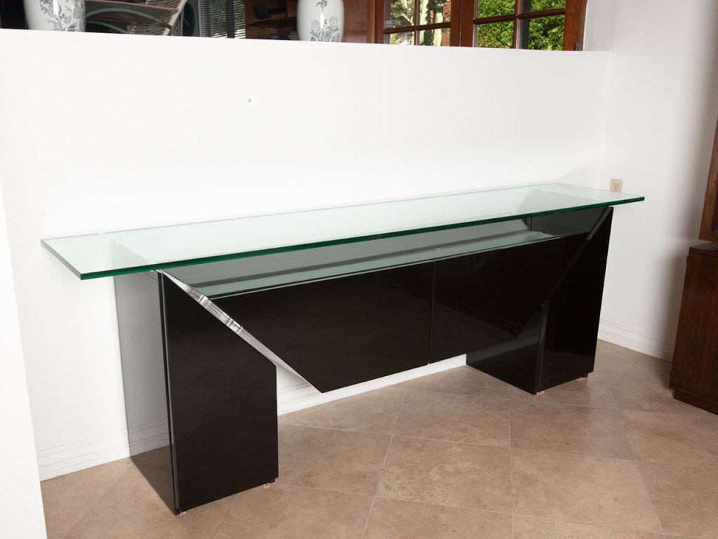 Black lacquered and glass sideboard / credenza / bar by GORGONI LUIGI 1983 for ROCHE BOBOIS France.  With out the glass this piece measures 82 1/2