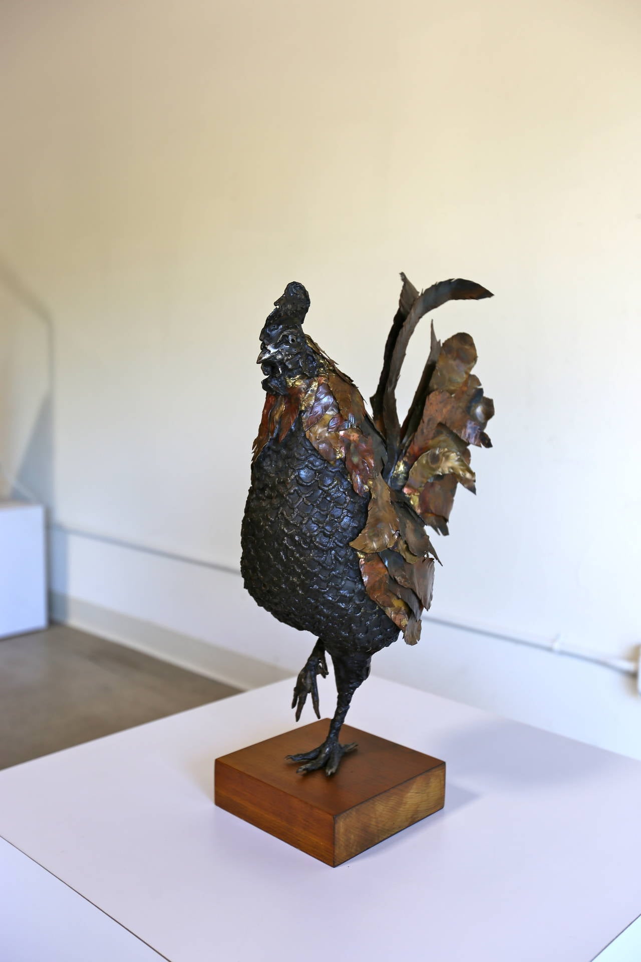 Rooster sculpture by Roger DiTarando.