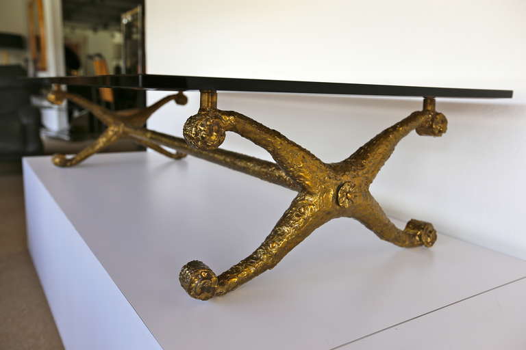 Bronze coffee table by Monteverdi-Young.

The base measures 56