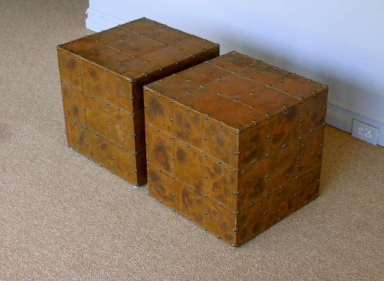 Pair of copper clad studded cube side tables. 