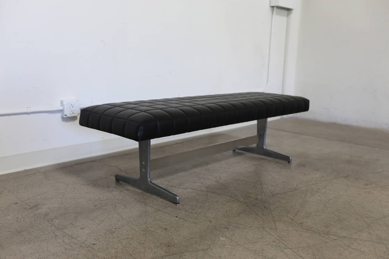 Bench by Madison Furniture. Box stitched with cast aluminum base.