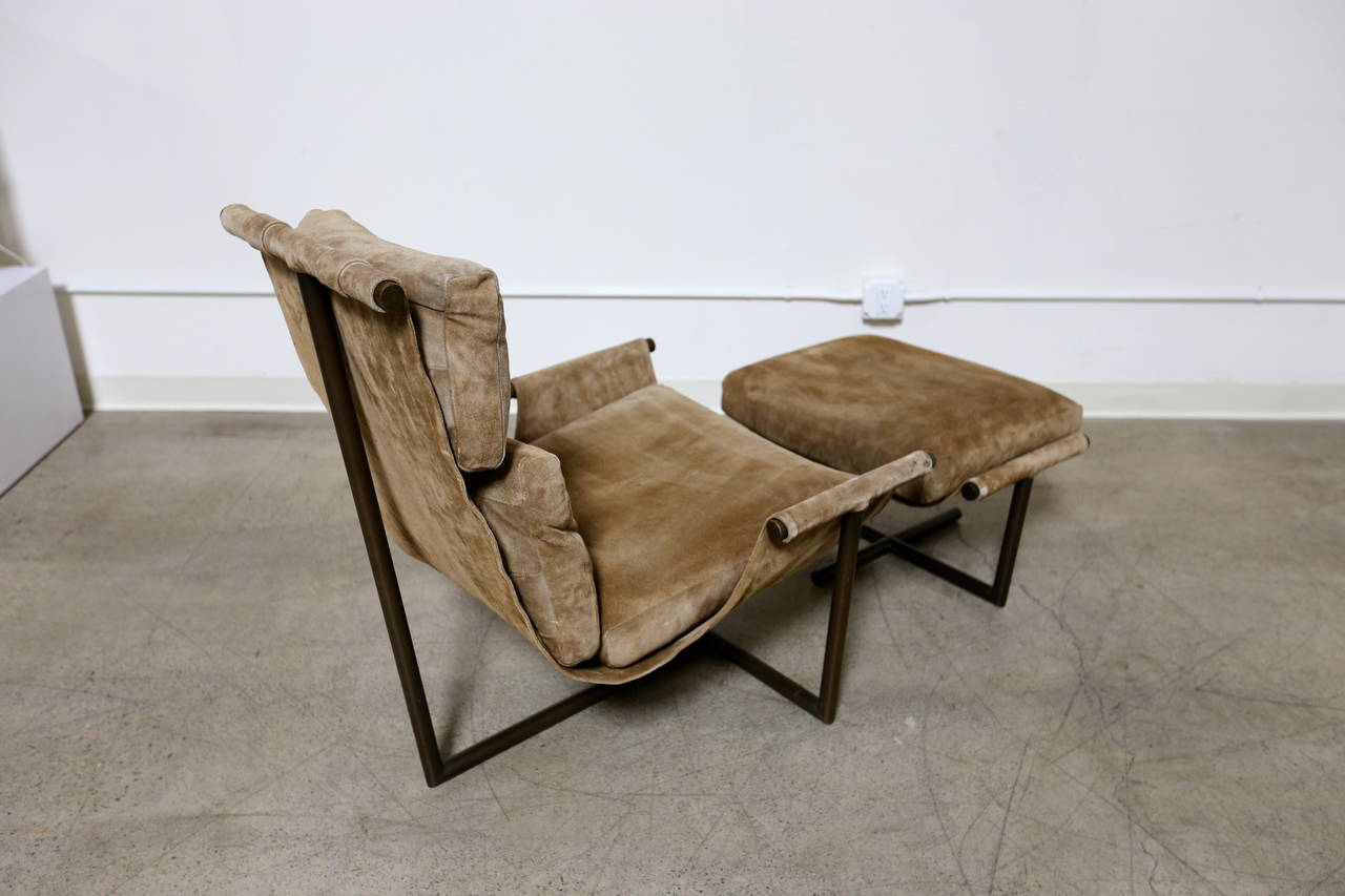 Lounge chair and ottoman by Jules Heumann for Metropolitan. Suede with a bronze finished 