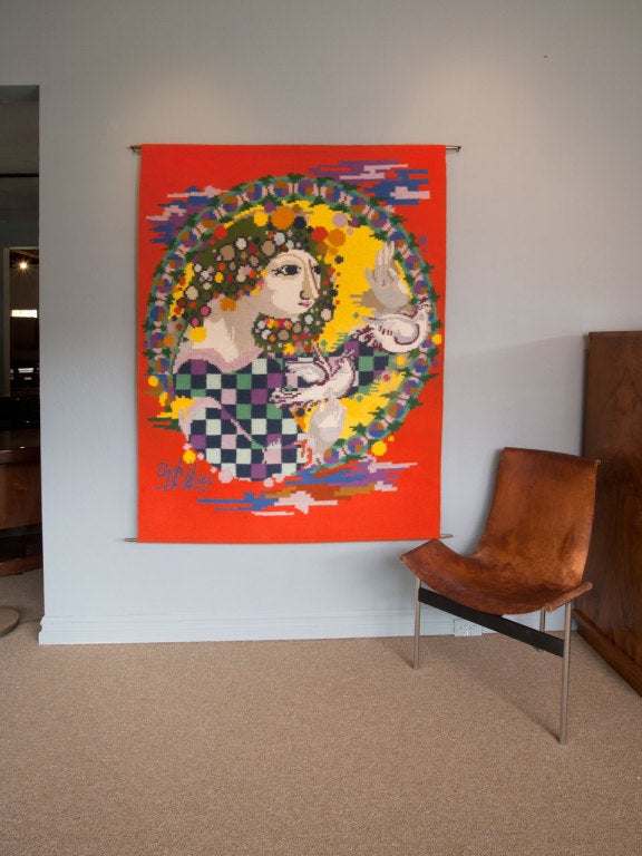 Large tapestry by Bjorn Wiinblad of Denmark.  A woman with birds.  A multitude of color and great combinations.  His work is based on music and the joy of life.