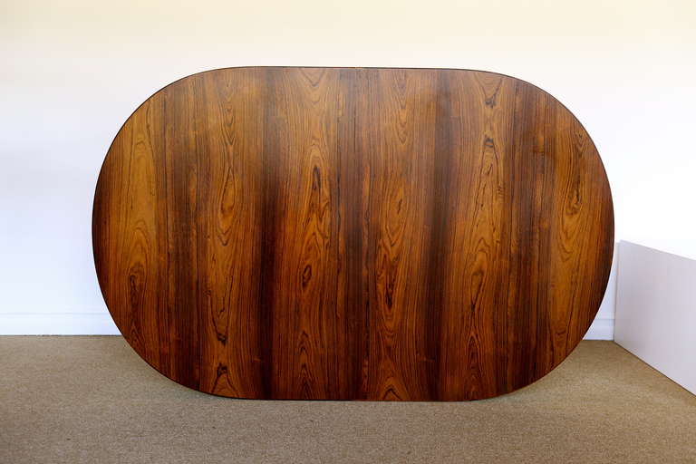 Rosewood Dining Table by Nils Jonsson for Troeds.  Highly figured rosewood grain.  This table comes with two leaves measuring 21 3/4