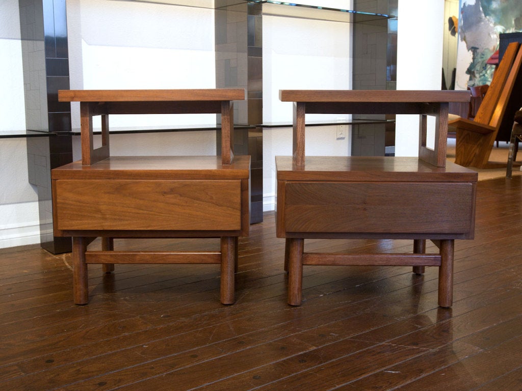 Pair of walnut nightstands by Merton Gershun for American of Martinsville.