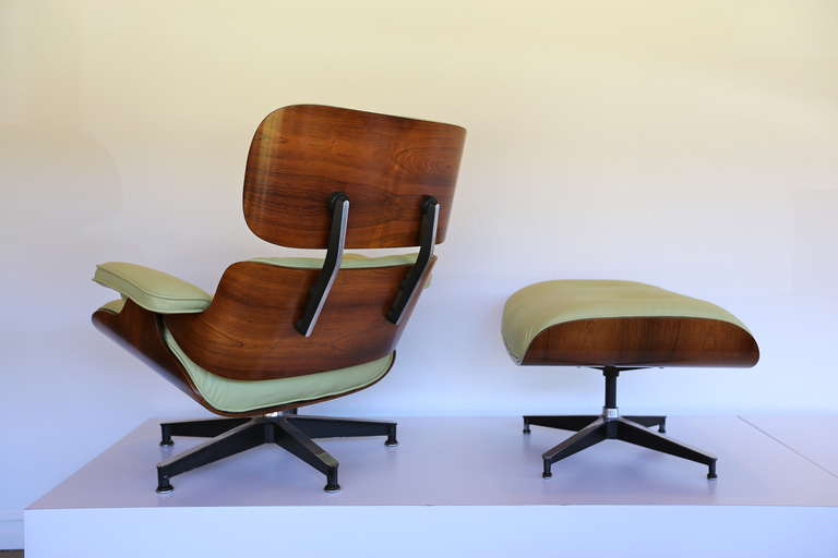 Pistachio Green Leather & Rosewood Lounge Chair and Ottoman by Charles Eames for Herman Miller.