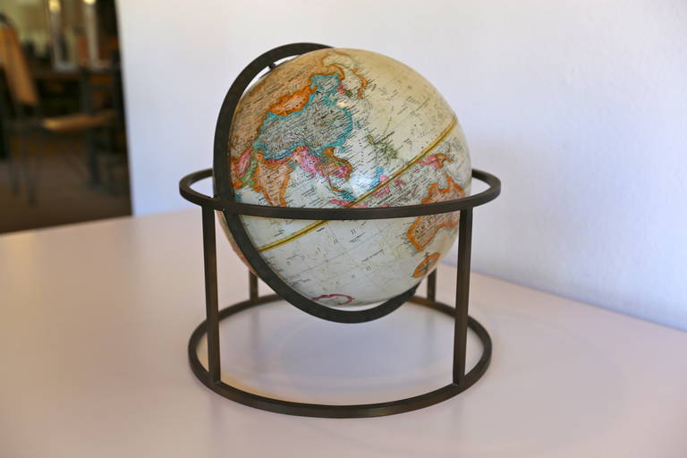 Modernist brass desk top globe. Excellent patina to the original brass stand.