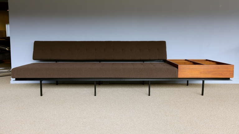 Sofa with magazine rack by Florence Knoll.