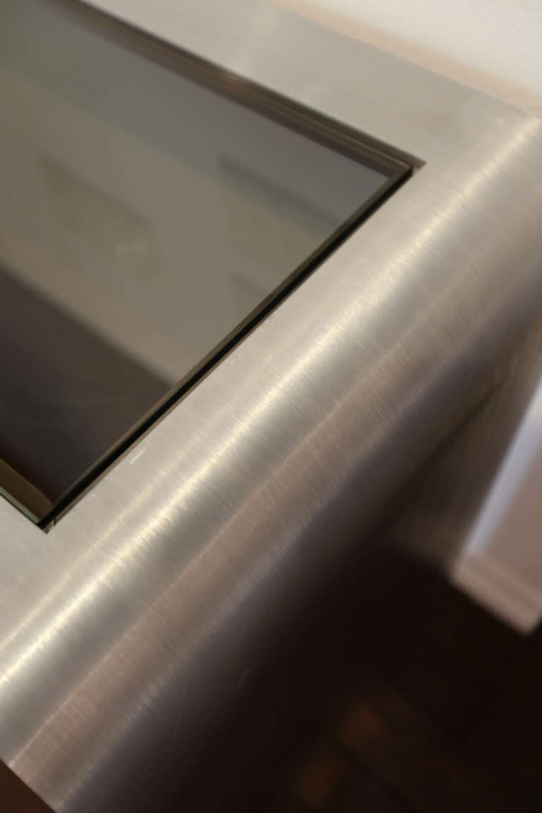 American Brushed stainless steel console table by Leon Rosen