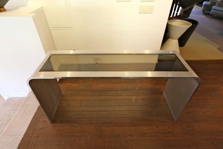 Brushed stainless steel console table by Leon Rosen 1