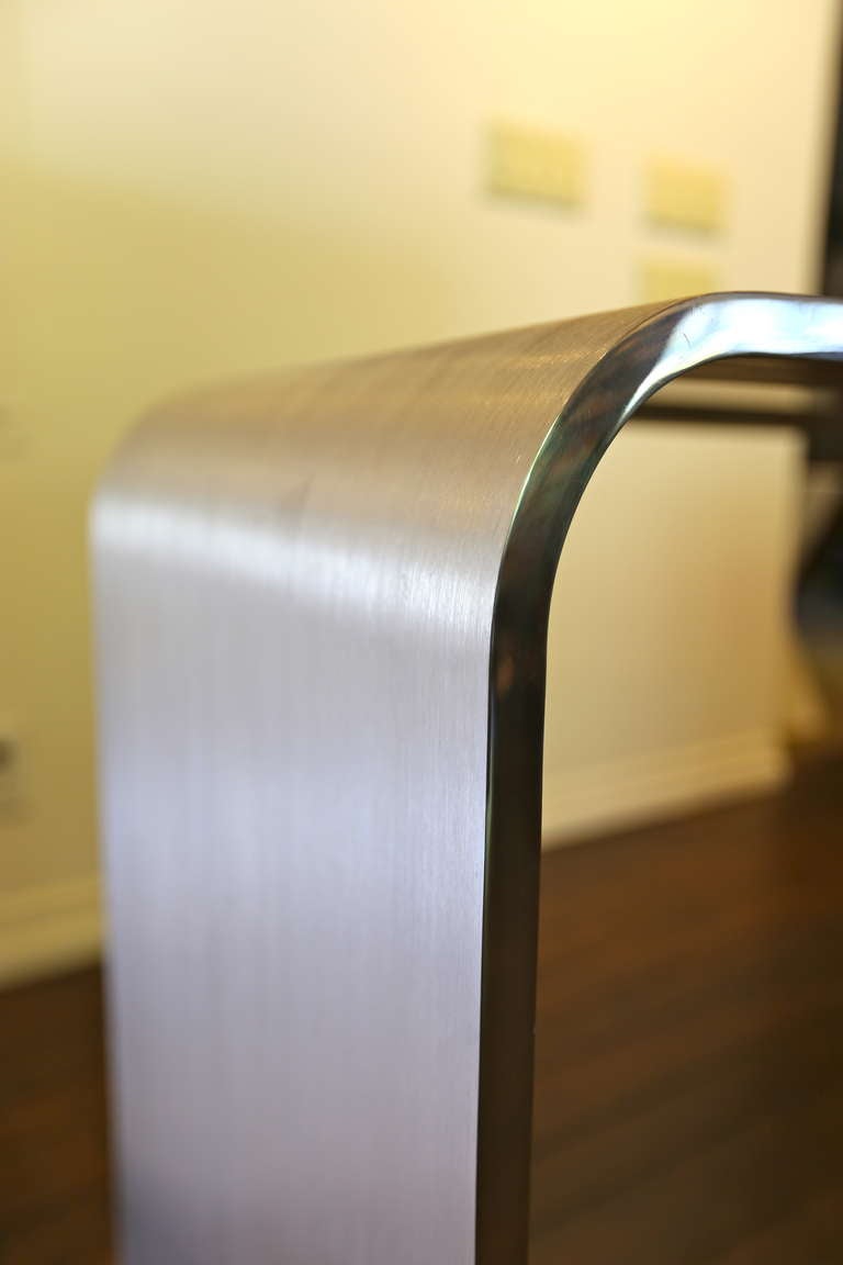Brushed stainless steel console table by Leon Rosen 3