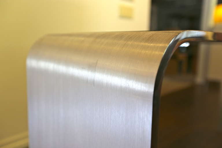 Brushed stainless steel console table by Leon Rosen 2