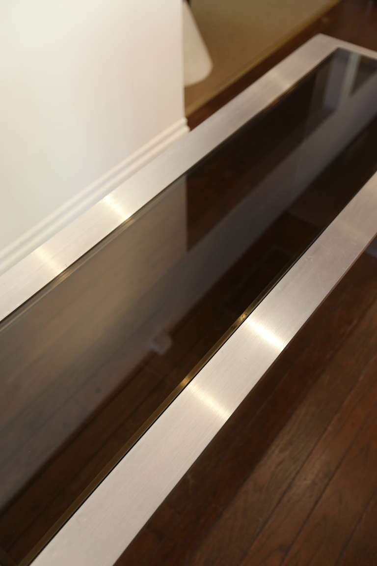 Brushed stainless steel console table by Leon Rosen 4