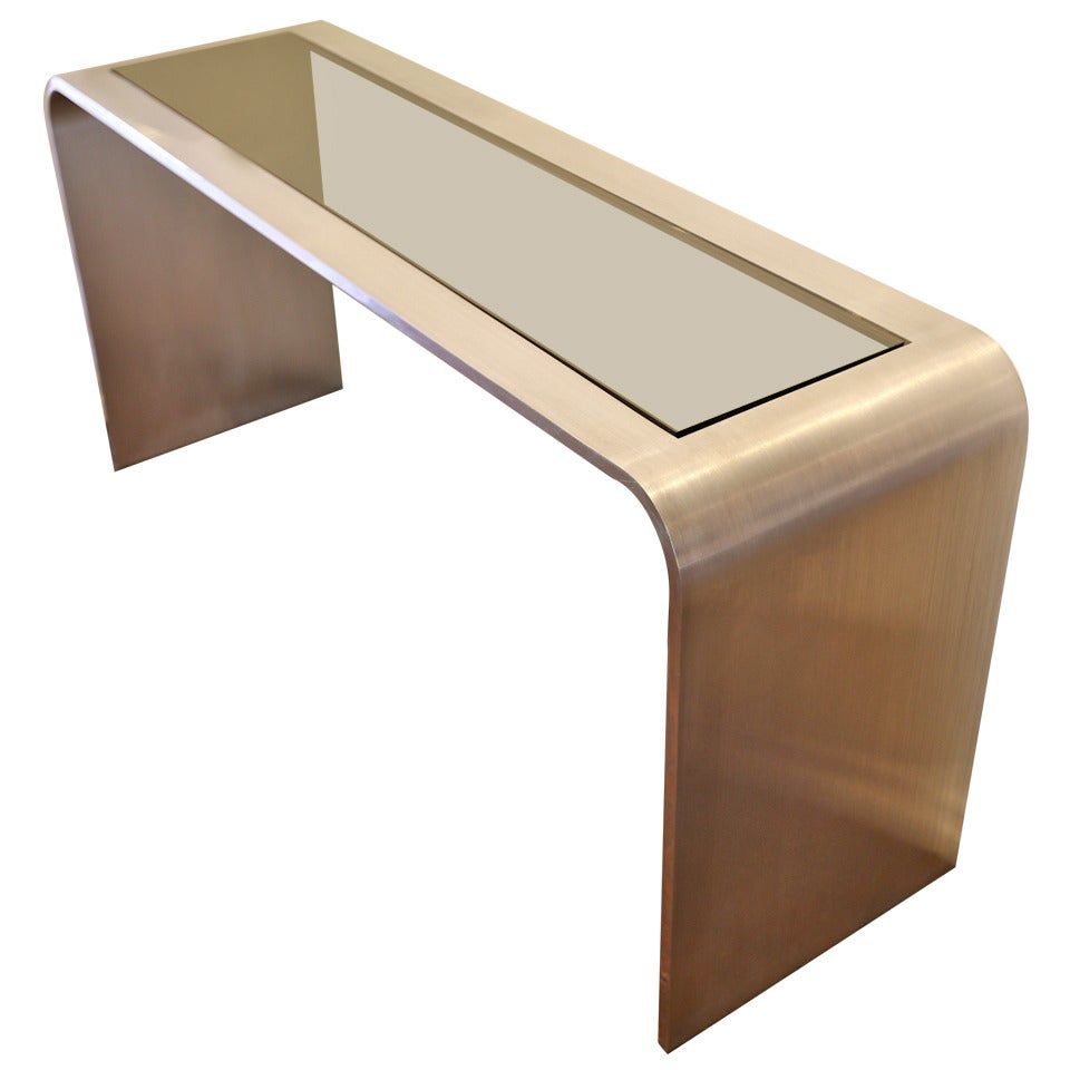 Brushed stainless steel console table by Leon Rosen