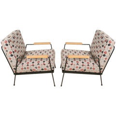 Pair iron lounge chairs by Inco with Eames fabric