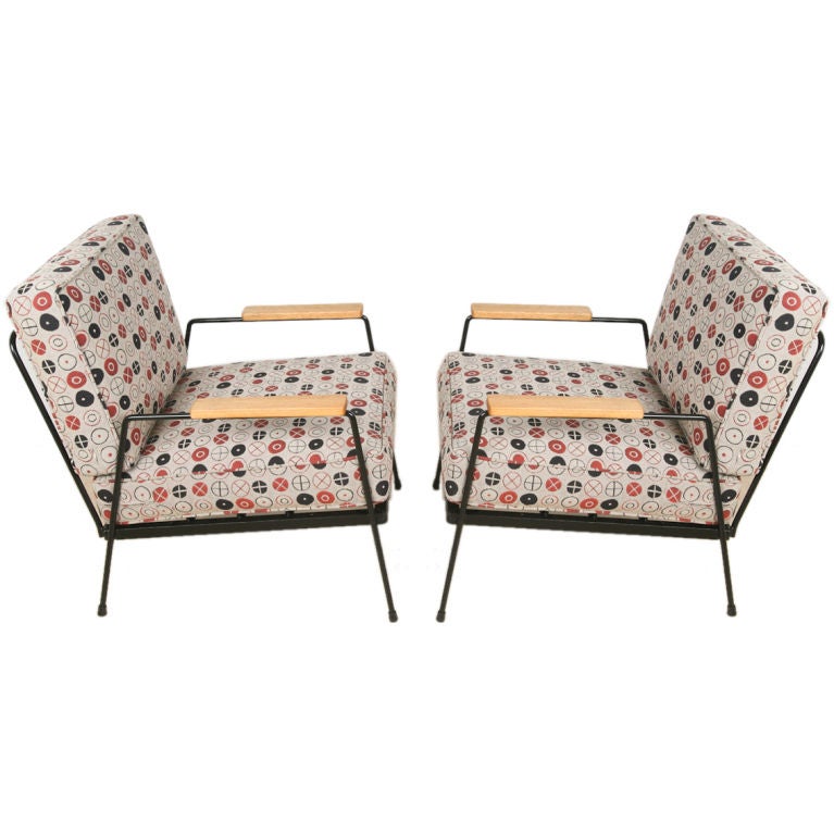 Pair iron lounge chairs by Inco with Eames fabric
