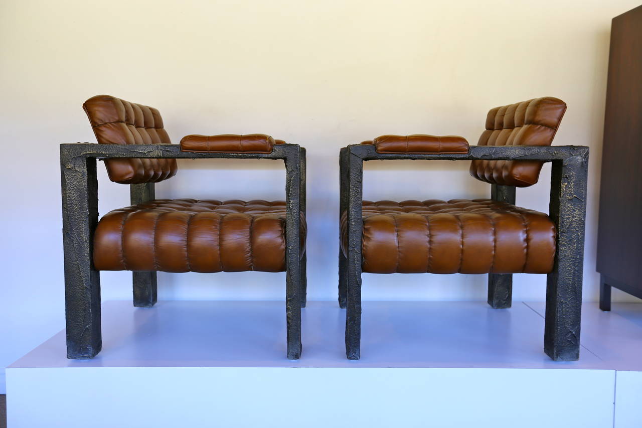 Pair of custom sculpted lounge chairs by Paul Evans signed PE 71. This pair is museum quality in original condition with a beautiful patina to the leather.