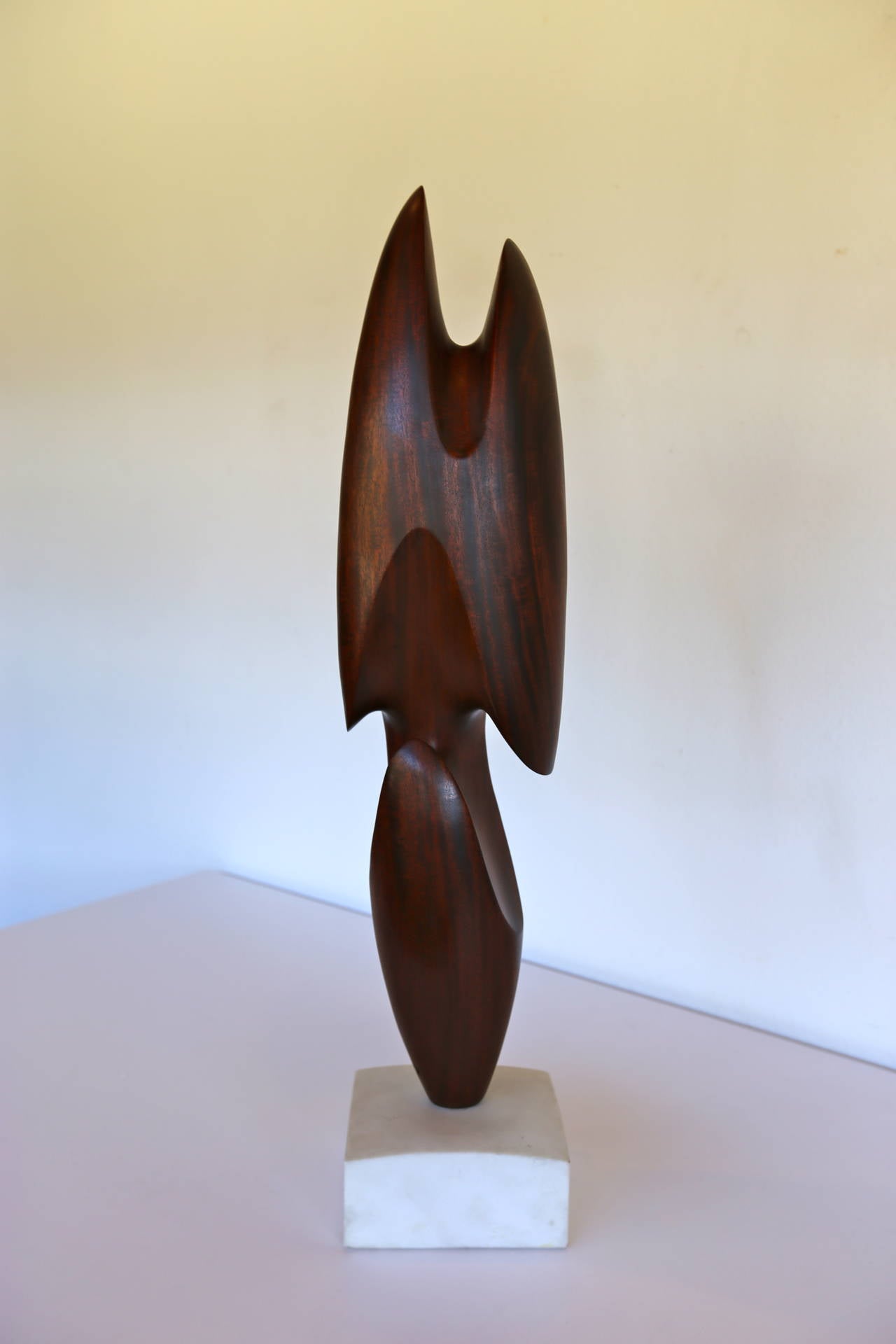 Organic abstract mahogany sculpture by sculptor Henry Moretti.