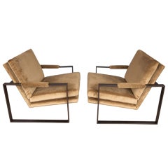 Pair of bronze lounge chairs by MILO BAUGHMAN 