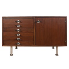 Compact walnut credenza by Jens Risom