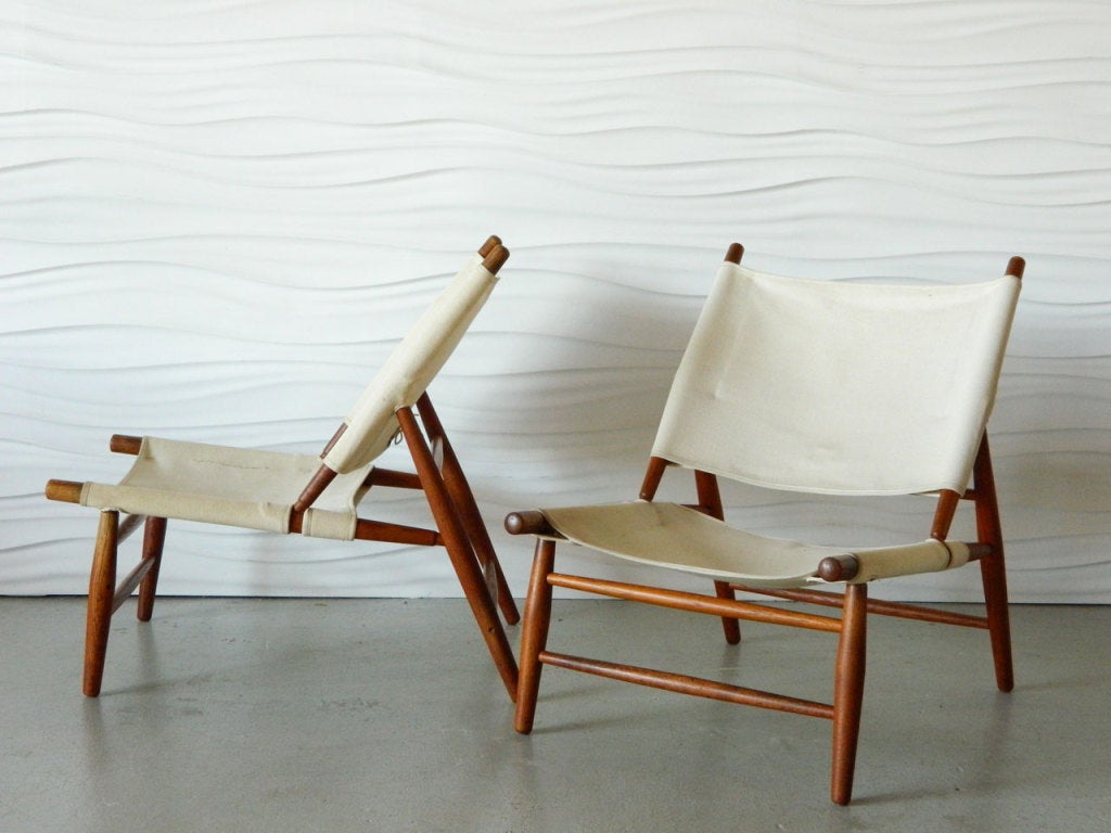 This rare pair of Vilhelm Wohlert canvas Triangle chairs were designed in 1952 while Wohlert was a professor at UC Berkeley. The chairs are low to the ground with a comfortable recline.
Wohlert was the co-architect of Denmark's Louisana Museum and