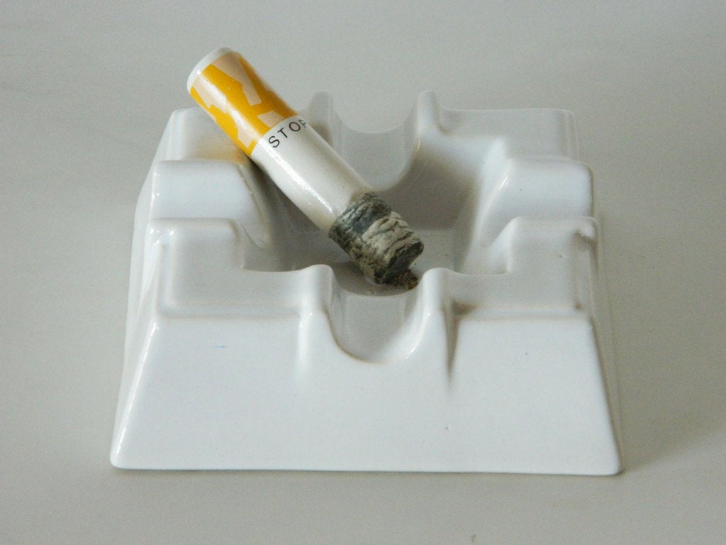 This ceramic tongue-in-cheek ashtray was designed by Arnold Chapkis in 1977.