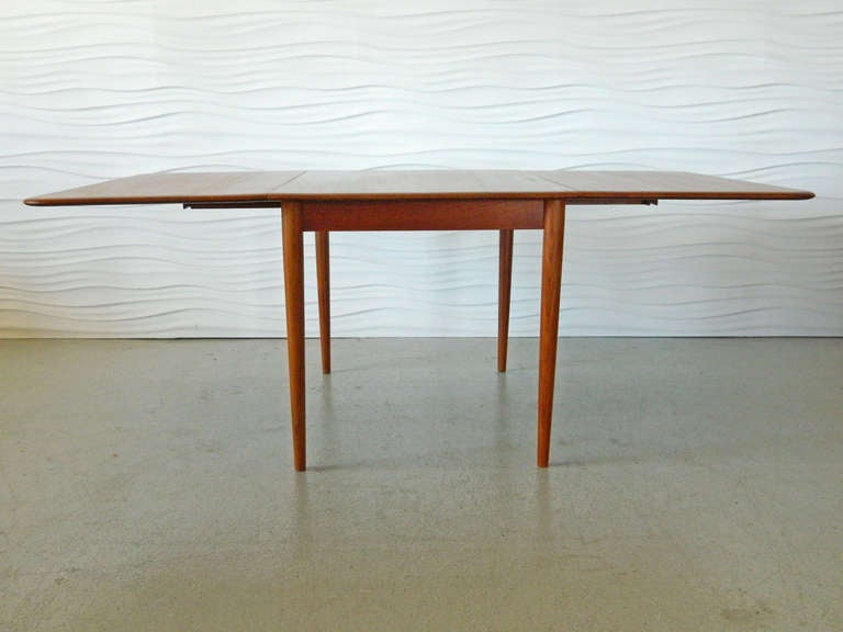 20th Century Danish Solid Teak Double Drop Leaf Table