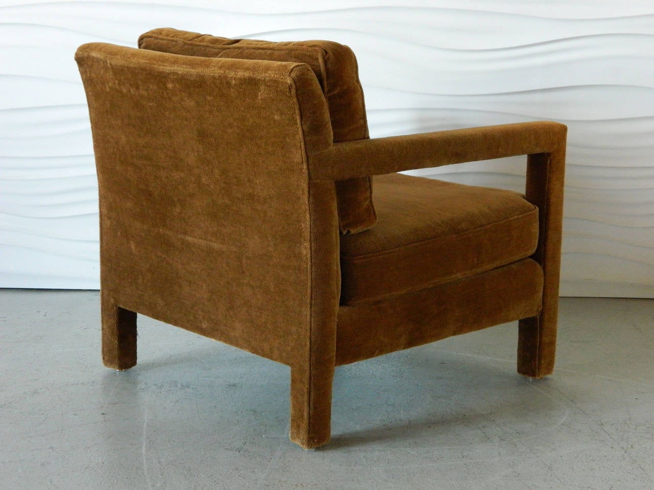 This vintage upholstered parsons chair was made in America and manufactured by Flair.