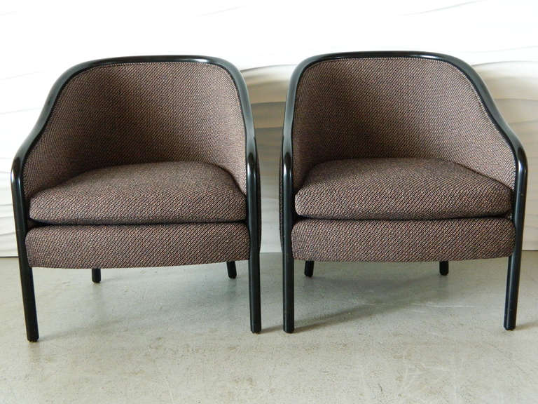 This pair of Ward Bennett chairs were manufactured by Brickel Associates, Inc in 1987. The chairs have black lacquered walnut frames. Original fabric.