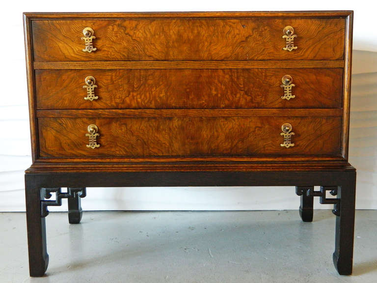 This pair of Hekman burl-fronted chests have a rich patina highighted by Asian-inspired brass hardware. Perfect as end tables or nightstands.