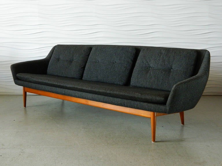 Clean lines and elegant curves make up this Scandinavian Modern sofa circa 1960s.